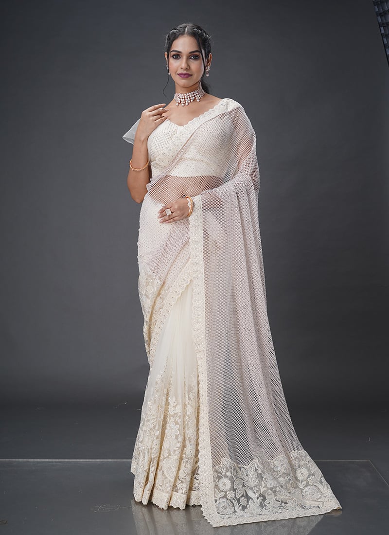 Radiate Elegance In White Net Stone Sequins Saree